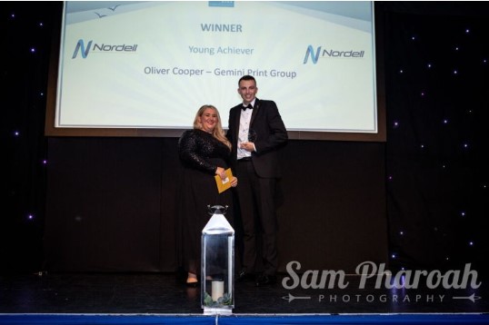 Emma Penn and Oliver Cooper onstage at the Worthing & Adur Business Awards,